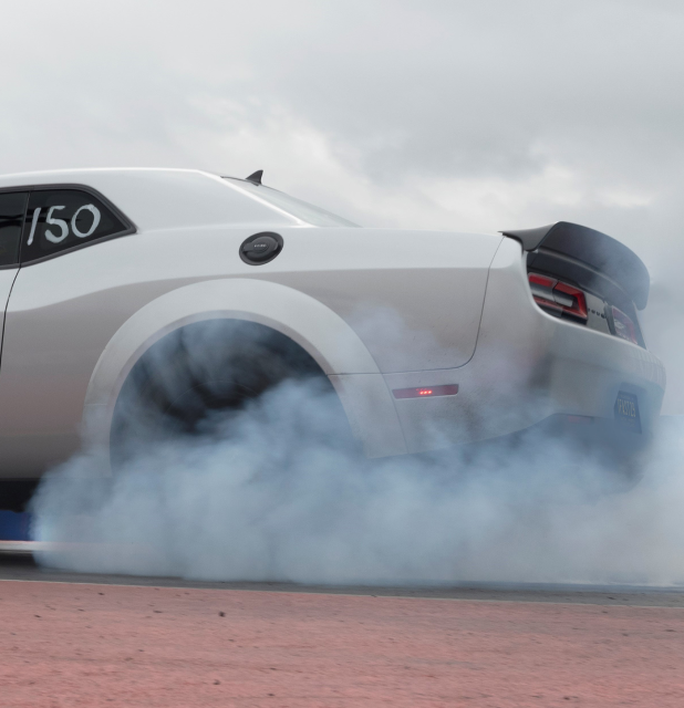 An SRT Demon 170 smokes its tires