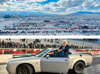 Aerial view of cars on display at Las Vegas Motor Speedway and Jay Leno standing next to an SRT Demon 170