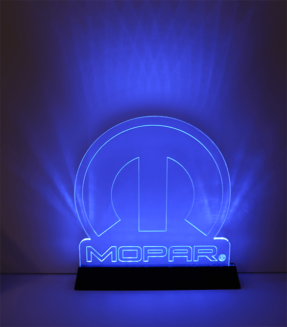 Illuminated glass Mopar logo light