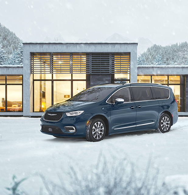 Chrysler Pacifica Hybrid on snow-covered driveway