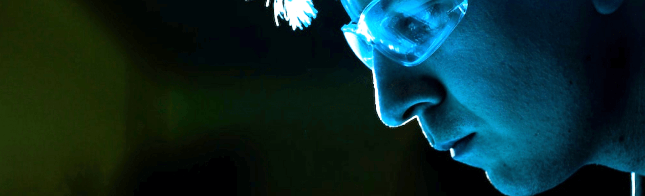 Man staring at blue glow