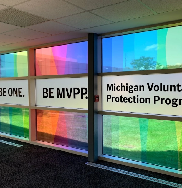An image of signage created for the CG Detroit Michigan Volunteer Protection Program