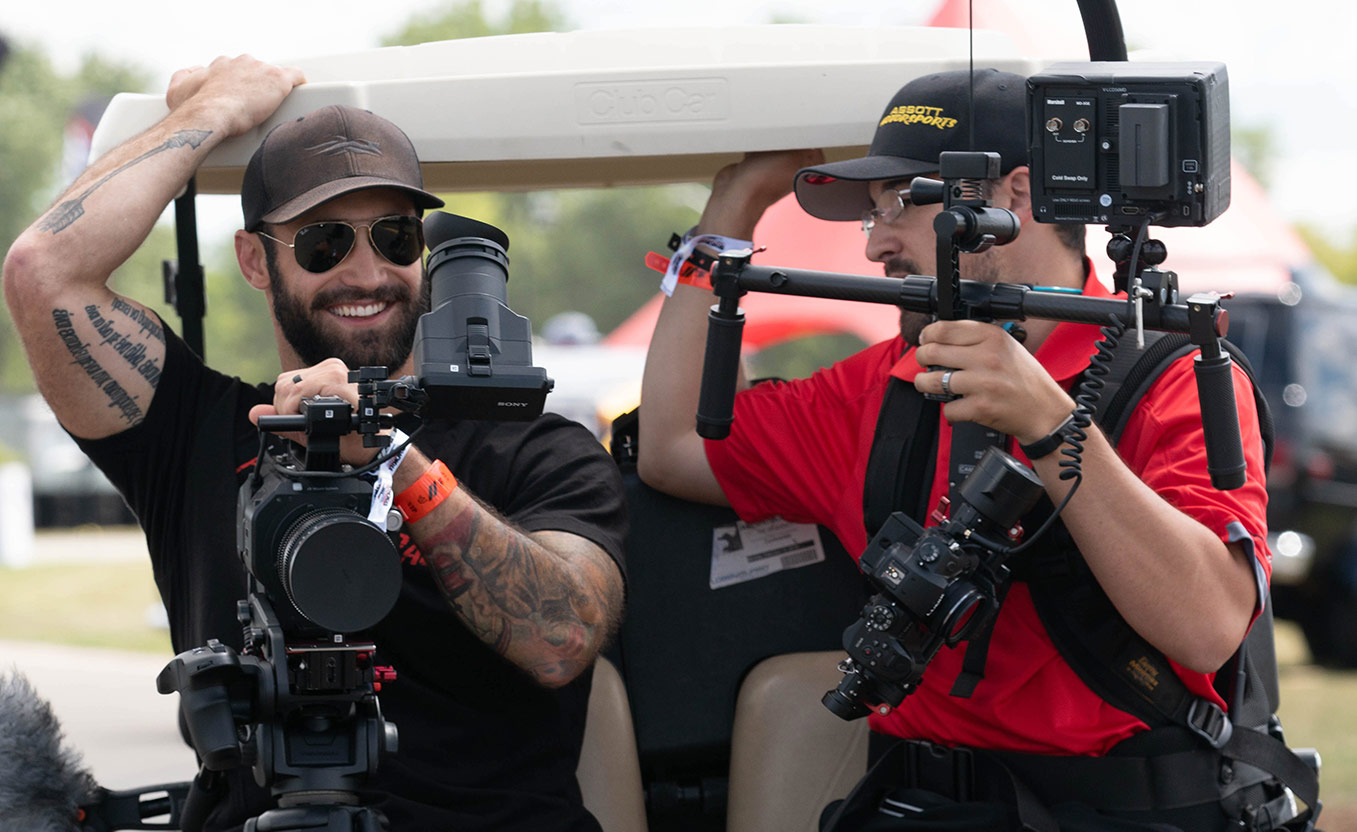 Two Jeep crew members enjoying their work