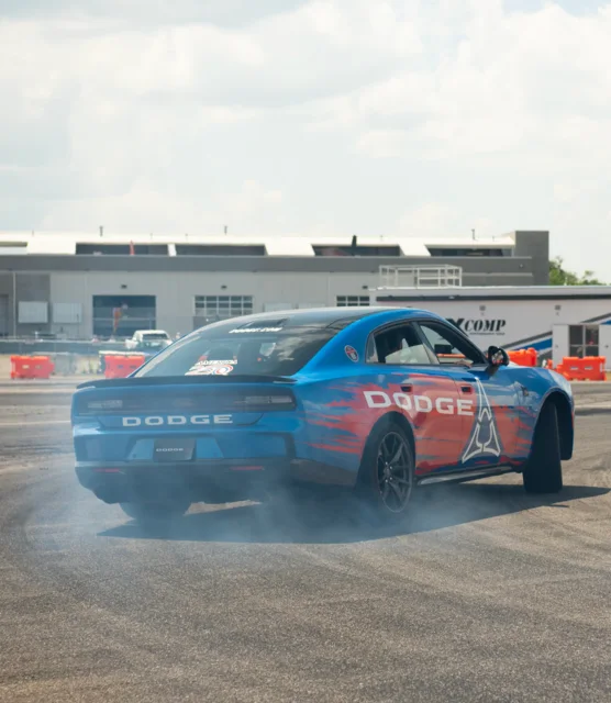 Blue Dodge Charger burnout during a Thrill Ride
